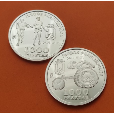 . 2 monedas @SI CÁPSULA@ ESPAÑA 1000 PESETAS 2000 JUEGOS PARALIMPICOS DE SIDNEY ATLETISMO CIEGOS + SILLA PLATA NO ESTUCHE