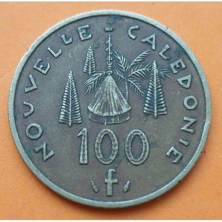 NUEVA CALEDONIA 100 FRANCOS 1976 DAMA y CABAÑA KM.14 MONEDA DE LATÓN MBC NOUVELLE CALEDONIE